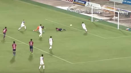 Most bizarre goal ever? Japanese footballer somehow scores LYING DOWN after header hits post (VIDEO)