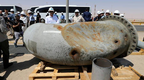 A damaged pipeline at Saudi Aramco oil facility in Khurais.