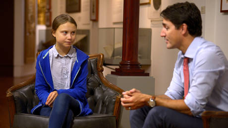 Canada's PM Justin Trudeau greets Greta Thunberg before a climate strike march in Montreal, Canada September 27, 2019.