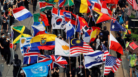 Hong Kong protesters add more foreign flags to their arsenal, including... East Timor & Papua New Guinea (VIDEOS)