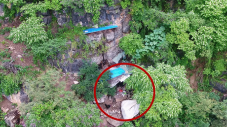 Human trafficker, on the run for 17 years after prison break, found in Chinese cave by police drone (PHOTOS)