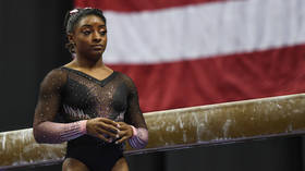 'Couldn't they have hired a black photographer?' Social justice warriors pick holes in Simone Biles' Vogue cover shoot