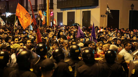 Peru at boiling point: Army and police side with president in standoff against parliament