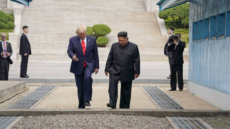 U.S. President Donald Trump meets with North Korean leader Kim Jong Un at the demilitarized zone separating the two Koreas, in Panmunjom, South Korea, June 30, 2019. © REUTERS/Kevin Lamarque