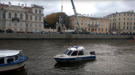 We need a bigger crane! WATCH runaway truck crane plunge into river in St. Petersburg (CCTV VIDEO)