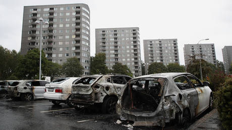 FILE PHOTO. Burned cars are pictured in Gothenburg, Sweden. © AFP / TT News Agency / Adam Ihse