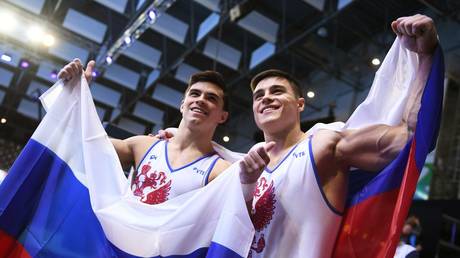 &lsquo;Never give up&rsquo;: Russian gymnasts beat China to claim maiden world crown