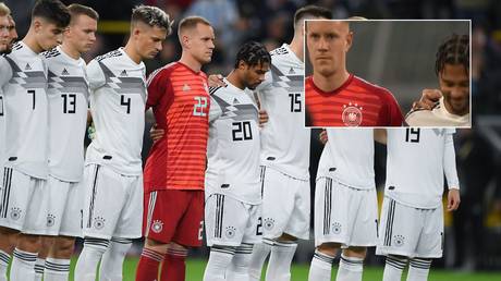 &lsquo;Why&rsquo;s he smiling?&rsquo; Confusion as German star Gnabry bursts out laughing during minute&rsquo;s silence for victims of synagogue attack
