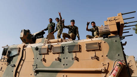 Ankara-backed forces reach strategic highway as Turkey pushes deeper into northeast Syria &ndash; reports