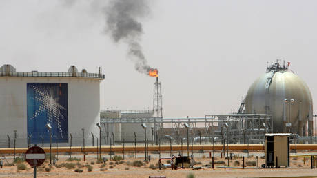 A gas flame is seen in the desert near the Khurais oilfield, Saudi Arabia. File Photo