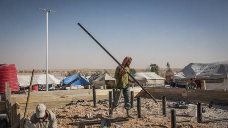 Hundreds of ISIS fighters&rsquo; family members flee Syrian Kurdish-guarded camp amid Turkey&rsquo;s ground offensive