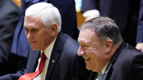 FILE PHOTO. Mike Pence and Mike Pompeo. ©REUTERS / Carlo Allegri