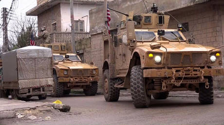 &lsquo;America is running away&rsquo;: Irate Kurds pelt withdrawing US forces with vegetables (VIDEO)
