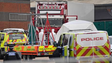 5db0431e2030277ce2792e97 15 migrants found inside packed truck in Britain as police arrest trafficking suspect