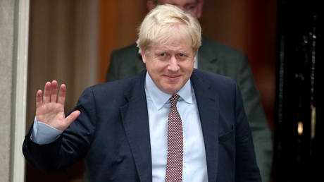 British Prime Minister Boris Johnson is seen outside Downing Street in London © REUTERS/Hannah McKay