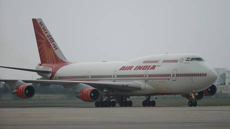FILE PHOTO: An Air India plane carrying Indian Prime Minister Narendra Modi arrives at Qingdao Liuting International Airport for the 18th Shanghai Cooperation Organization (SCO) Summit in Qingdao city, Shandong province, China June 9, 2018.  © REUTERS/Wu Hong/File Photo