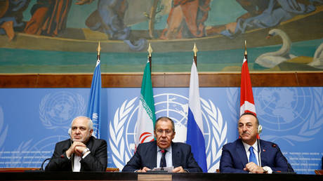 Turkey's Foreign Minister Mevlut Cavusoglu, Iran's Foreign Minister Mohammad Javad Zarif and Russian Foreign Minister Sergei Lavrov in Geneva, Switzerland, October 29, 2019.