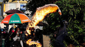 Protesters hurl petrol bombs at police station as Hong Kong descends into chaos (VIDEOS)