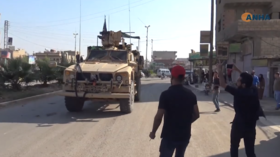 ‘America is running away’: Irate Kurds pelt withdrawing US forces with vegetables (VIDEO)