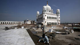 Laborers are seen working on the site around Guru Nanak's tomb in Kartarpur, Pakistan on September 16, 2019.