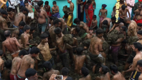 No bull: WATCH Indians engage in massive COW DUNG fight for Gore Habba festival