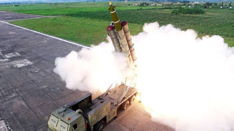 FILE PHOTO North Korean army test-fires a multiple rocket launcher. ©  KCNA / KNS / AFP