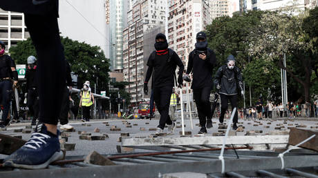 Hong Kong protesters vandalize & set fire to Xinhua news agency office (PHOTOS)
