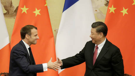 5dc284b185f5402e8849d291 China, France reaffirm support for Paris climate agreement as Macron visits Beijing