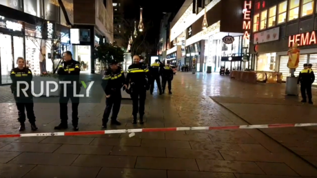 Police cordon off a street in Den Haag following a stabbing