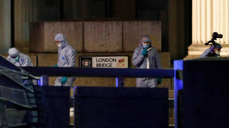 Forensics officers are seen near the site of a stabbing attack at London Bridge, November 29, 2019