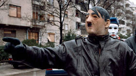 Tear gas, water cannons, fuel bombs & barricades as protesters clash with police in Hong Kong