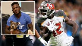 How NFL wide receiver Chris Godwin is helping save dogs... by catching passes