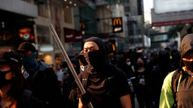 Battleground Hong Kong: Rioters armed with catapults & javelins destroy university campuses & metro stations, clashing with police