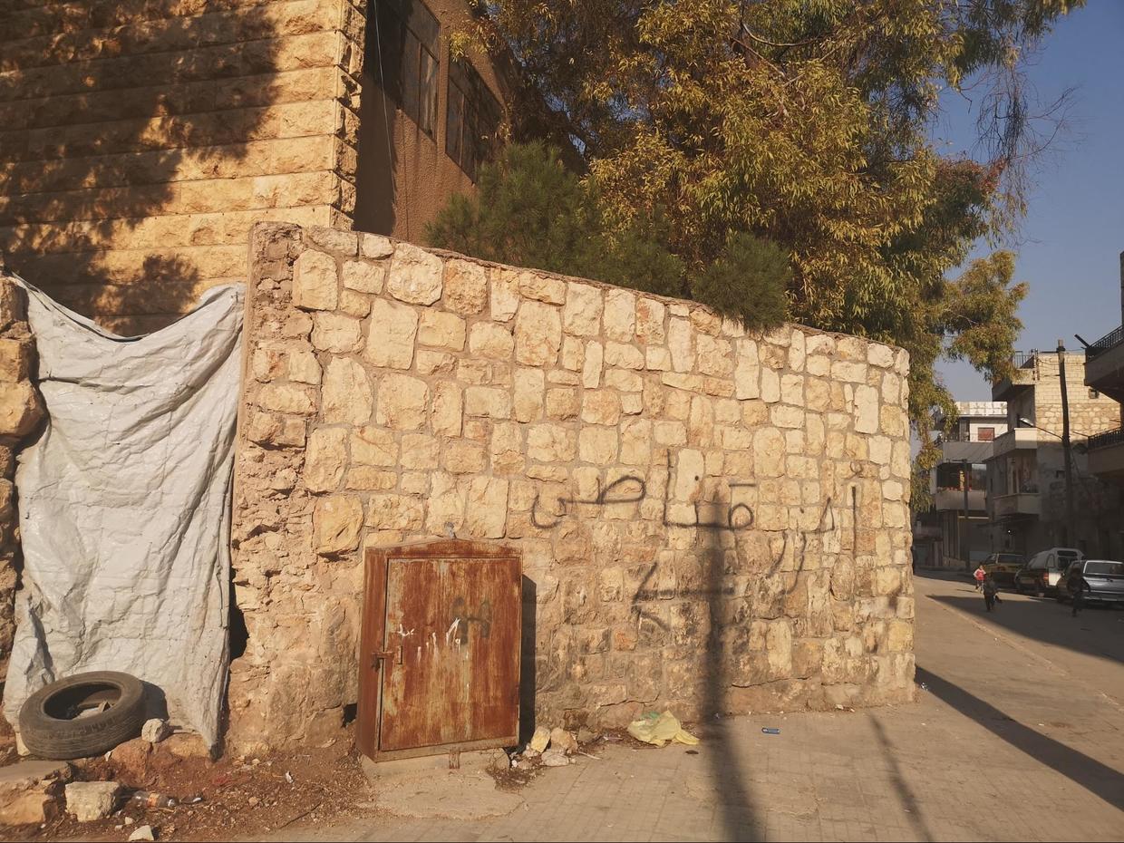 A street corner in Khalidiyah, west Aleppo warning people of snipers if they cross the street. ©  Vanessa Beeley