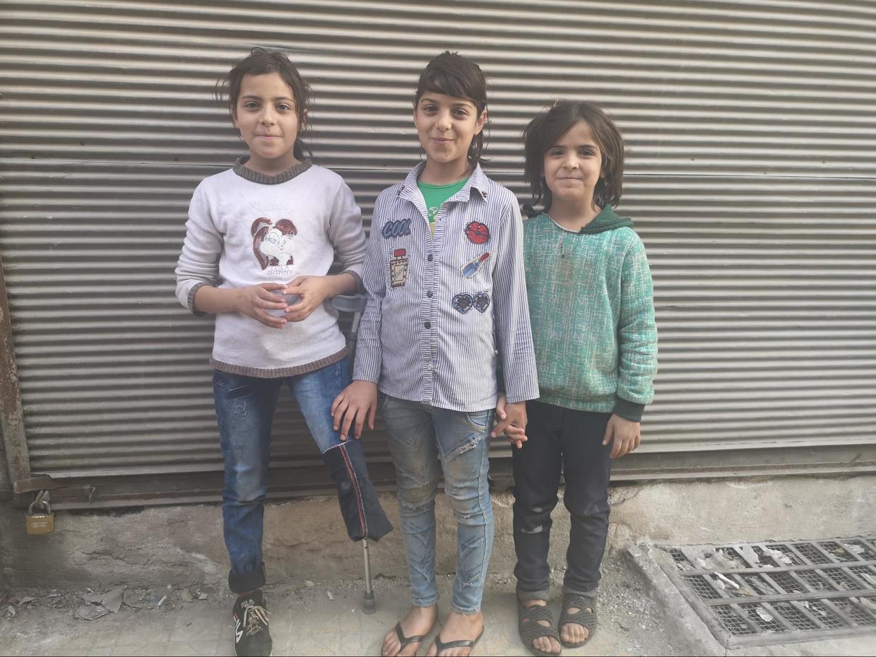 Nine-year-old Malak with her sisters in Khalidiyah, west Aleppo. ©  Vanessa Beeley 