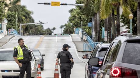 WATCH police & robbers exchange gunfire in the middle of BUSY INTERSECTION after high-speed chase in Florida (VIDEOS)