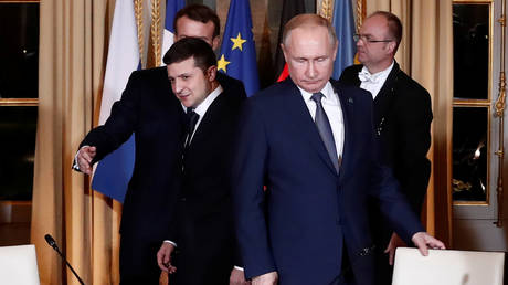Russian President Vladimir Putin (right) and Ukrainian President Volodymyr Zelenskiy (left) at the Elysee Palace in Paris, France December 9, 2019.