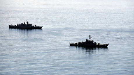 Two warships are seen during joint Iran-Russia-China naval drills in the Indian Ocean and the Gulf of Oman.