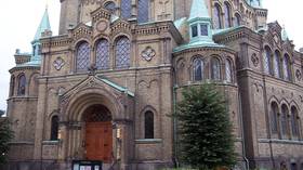 Church of Sweden unveils altarpiece of paradise featuring gay couples and transgender serpent