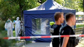 Police officers investigate a crime scene in Berlin, Germany, August 23, 2019, after a cyclist shot at a man in the Moabit district. © Reuters / Fabrizio Bensch