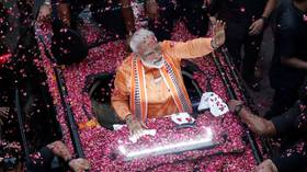 Tens of thousands march in Paris in ongoing strikes against pension reform