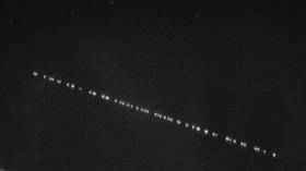‘All hail the overlords!’: Stargazers mystified by unexplained lights in the night sky (PHOTOS)