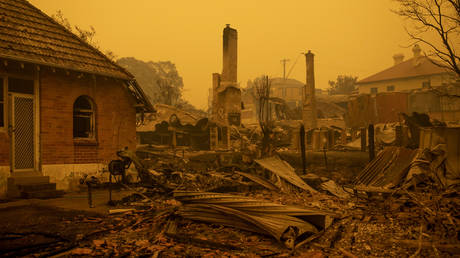 The remains of burnt out buildings are seen along main street in the town of Cobargo on December 31, 2019.