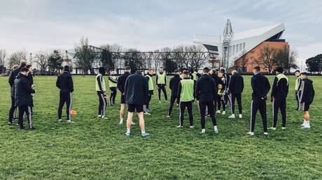 Taking the p*ss! Sheffield United players left in hysterics as dog PEES on training gear ahead of Liverpool clash (VIDEO)