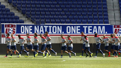 FILE PHOTO: Members of the US men's national soccer team run together during a team training session in Harrison, New Jersey.