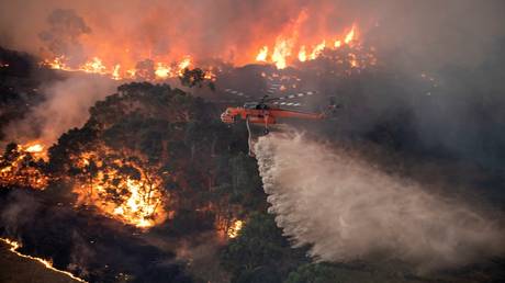 FILE PHOTO: A bushfire near Bairnsdale in Victoria's East Gippsland region © AFP