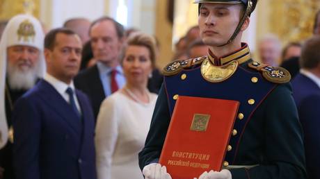 FILE PHOTO: A copy of the Russian Constitution © RIA Novosti / Ekaterina Shtukina