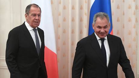 FILE PHOTO: Russian Foreign Minister Sergey Lavrov (L) and Russian Defense Minister Sergey Shoigu (R).