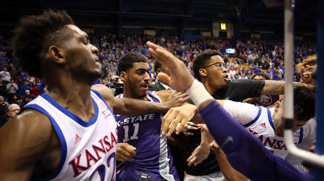 &lsquo;Simply unacceptable&rsquo;: Police break up Kansas college basketball brawl after punches fly and chair wielded as weapon (VIDEO)