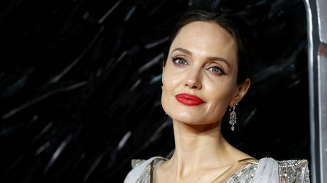 FILE PHOTO: Angelina Jolie poses as she attends the UK premiere of "Maleficent: Mistress of Evil" in London, Britain October 9, 2019. Reuters / Peter Nicholls